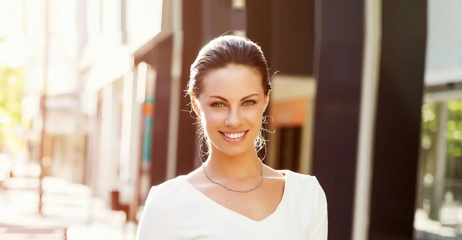 a banner image showcasing a woman glowing face after aesthetic treatment at lynchburg aesthetics and wellness
